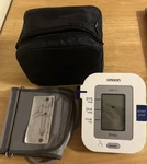 Omron HEM-711 Digital Blood Pressure Monitor With Arm Cuff And Bag. Fixed Price $18.00.
