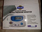 Welby Automatic Digital Blood Pressure Monitor Brite Sensor, Open Unused. Fixed Price $13.39.