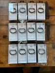 12 Misfit Ray Fitness Sleep Monitors: Mix Of Rose Gold And Carbon Black - Sealed. Fixed Price $135.00.