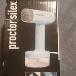 Proctor Silex Handheld Garment Steamer Iron 11585 Light Blue W/ Brush. Fixed Price $14.18.