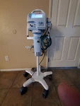 Newport Medical HT70 Plus Respiratory Ventilator + Cart O2 Mixer & Hoses. Fixed Price $1840.57.