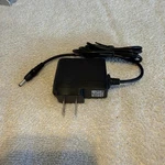 Adaptor For Black Cell Phone. Fixed Price $9.00.